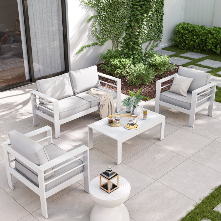 Rotella 4 Person Outdoor Seating Group with Cushions Wade Logan Frame Color Finish Dark Gray Cushion Color Light Gray